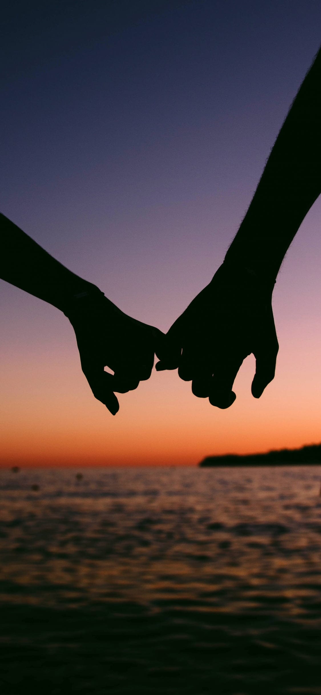 hands together couple silhouette sunset romantic 1125x2436 478
